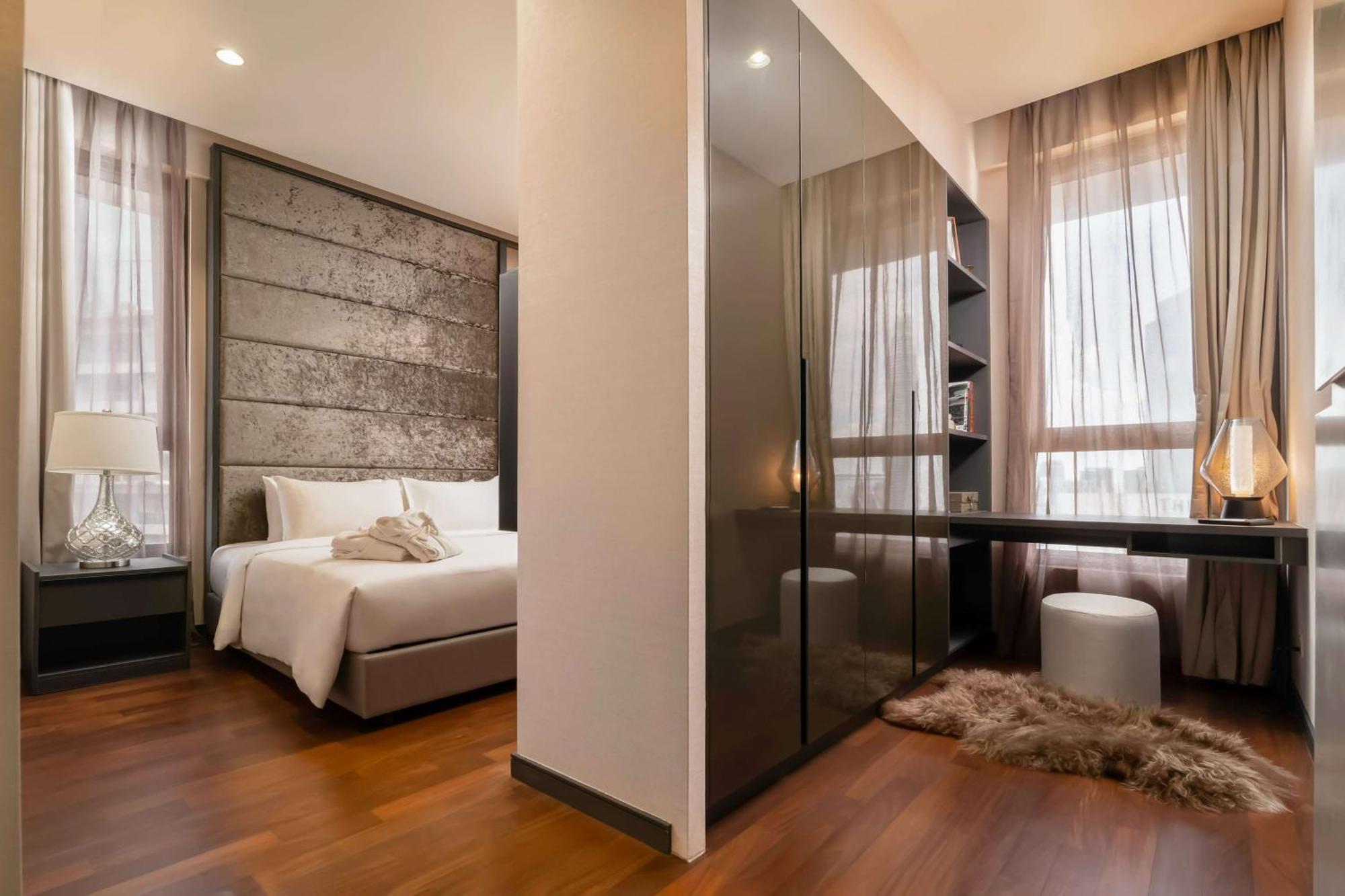 Wyndham Suites Klcc クアラルンプール エクステリア 写真 A bedroom in a condominium